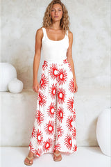 Model wearing Channing Pants in Solar Print Red from Salty Crush