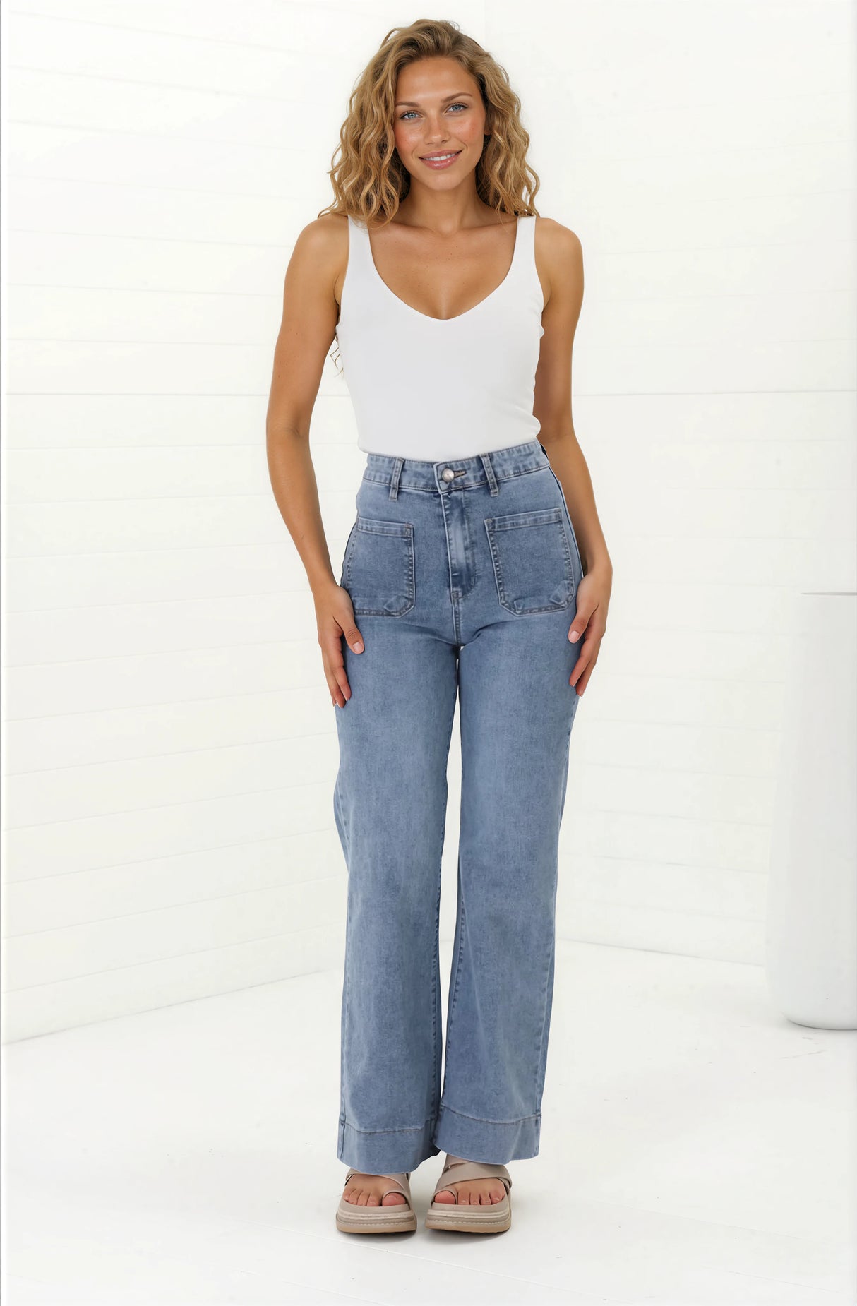 Model wearing Cindy Jeans in Stone Wash Denim from Salty Crush