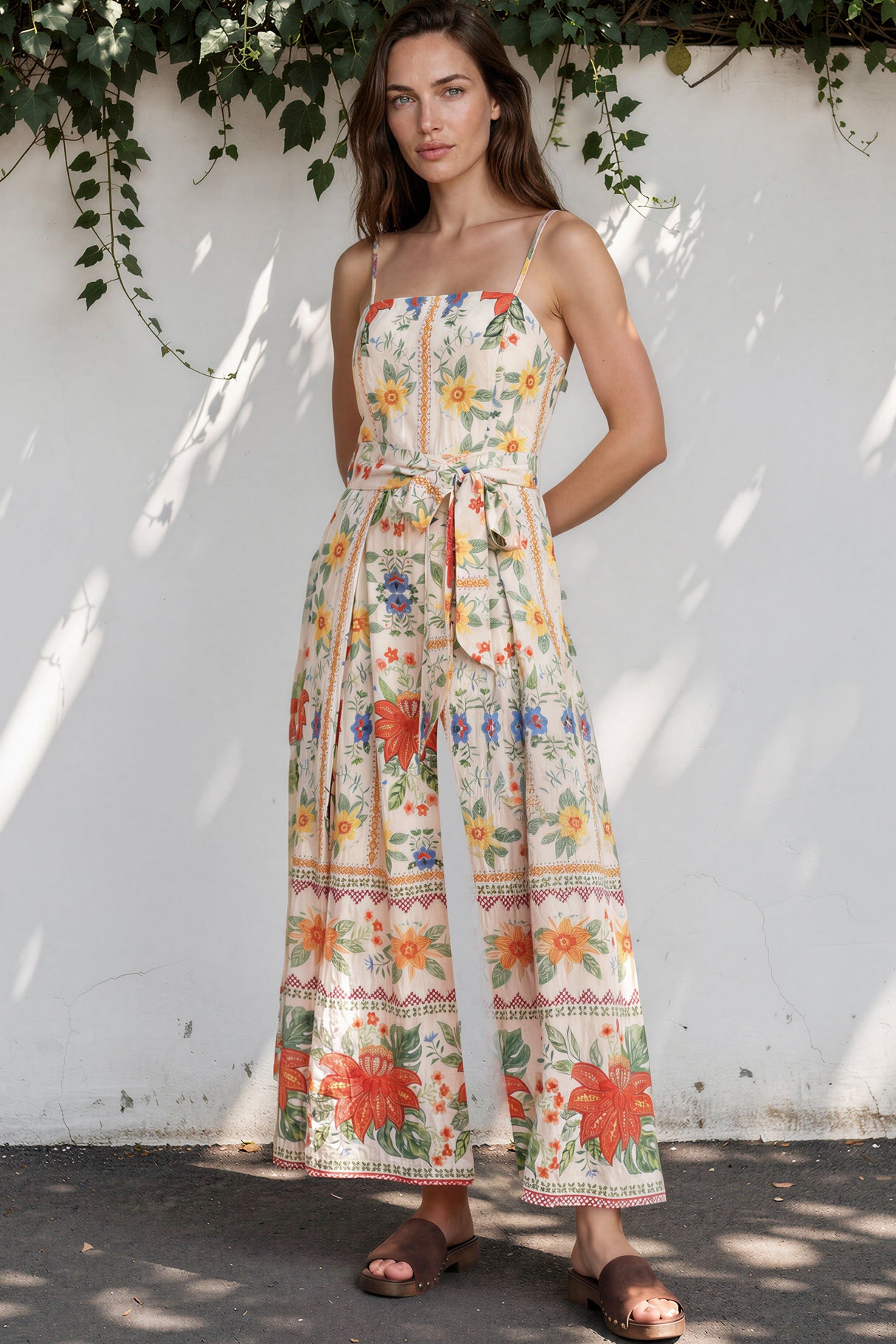 Model wearing Citrine Jumpsuit in Alma Print from Salty Crush
