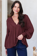 Model wearing Coral Top in Wine from Salty Crush