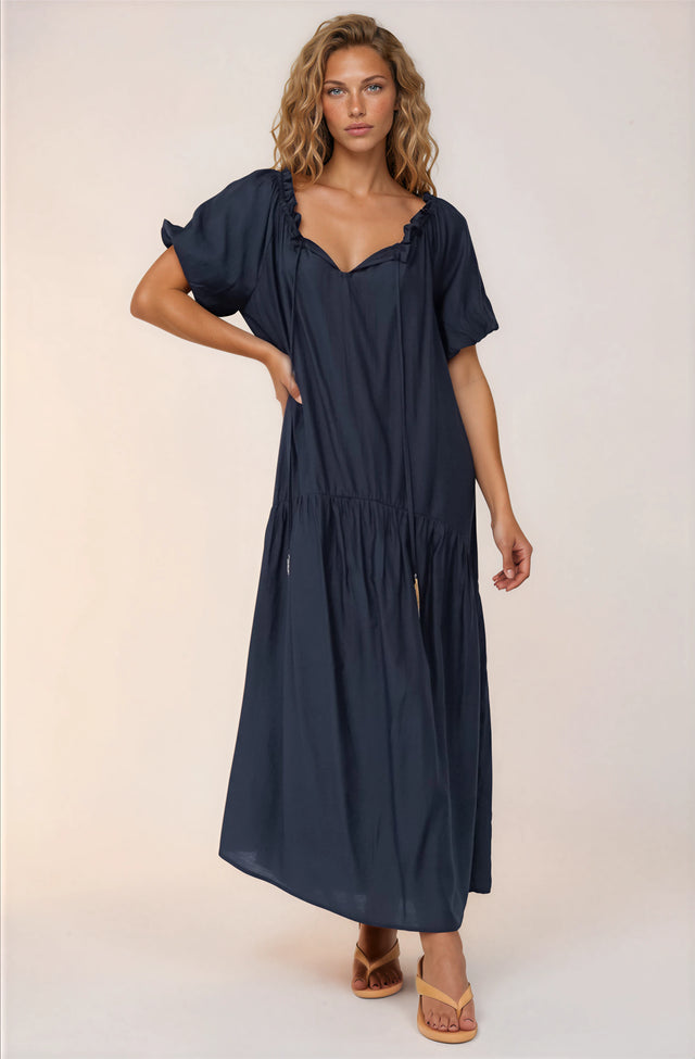 Model wearing Cristina Maxi Dress in Navy from Salty Crush