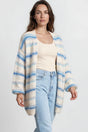 Model wearing Delaney Cardigan in Blue from Salty Crush