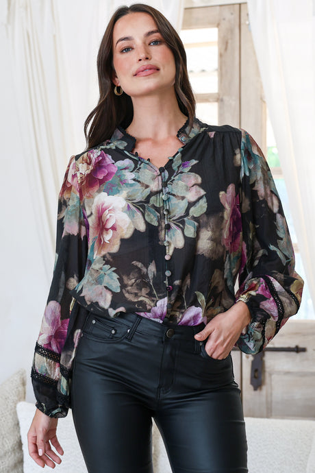 Model wearing Diandra Blouse in  Scandalous Print from Salty Crush