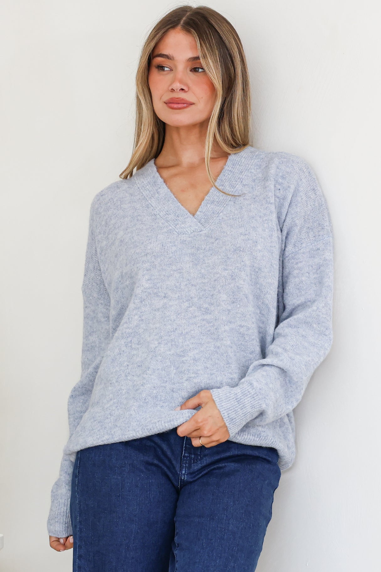 Model wearing Donoven Jumper in Light Denim Blue from Salty Crush