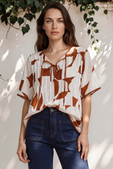 Model wearing Druitt Top in Oasis Print from Salty Crush