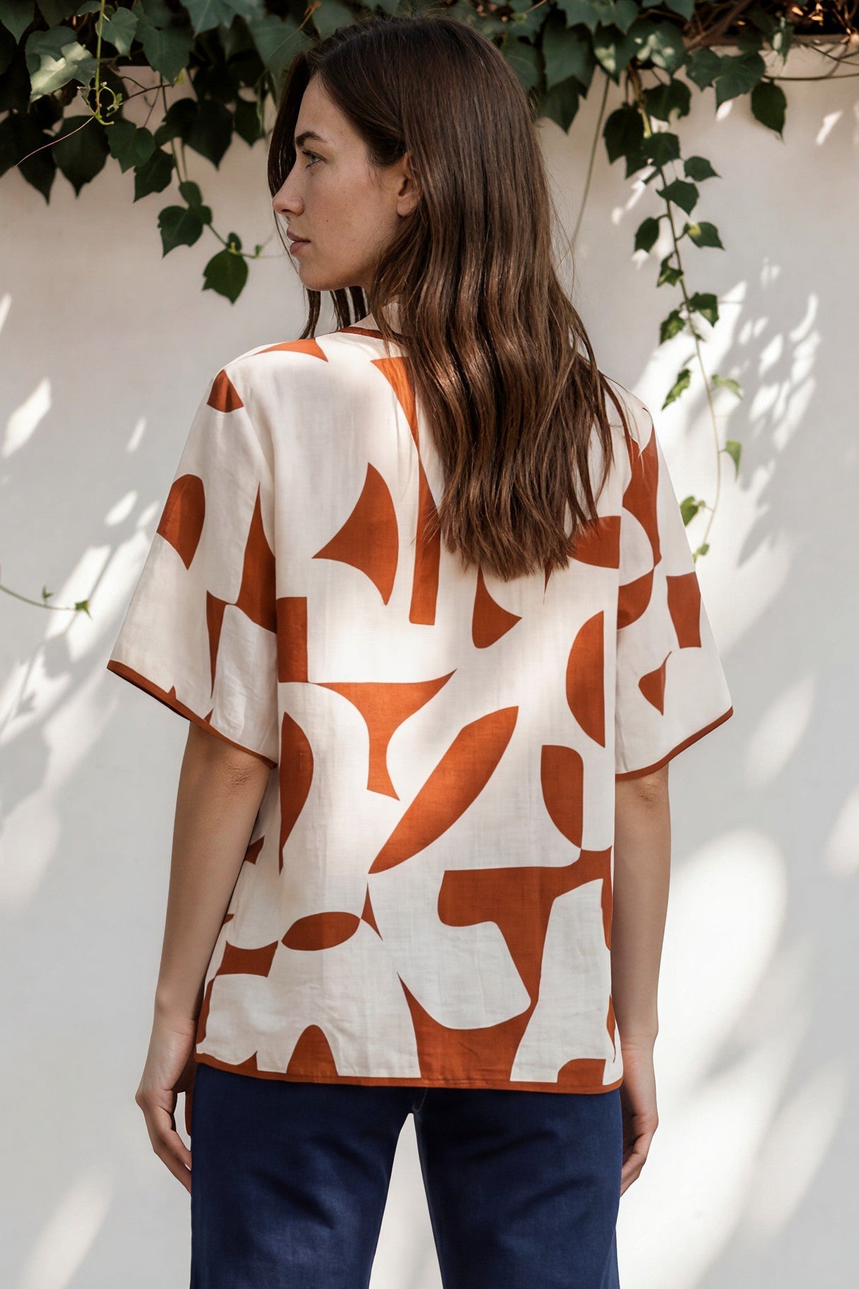 Model wearing Druitt Top in Oasis Print from Salty Crush