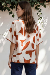 Model wearing Druitt Top in Oasis Print from Salty Crush