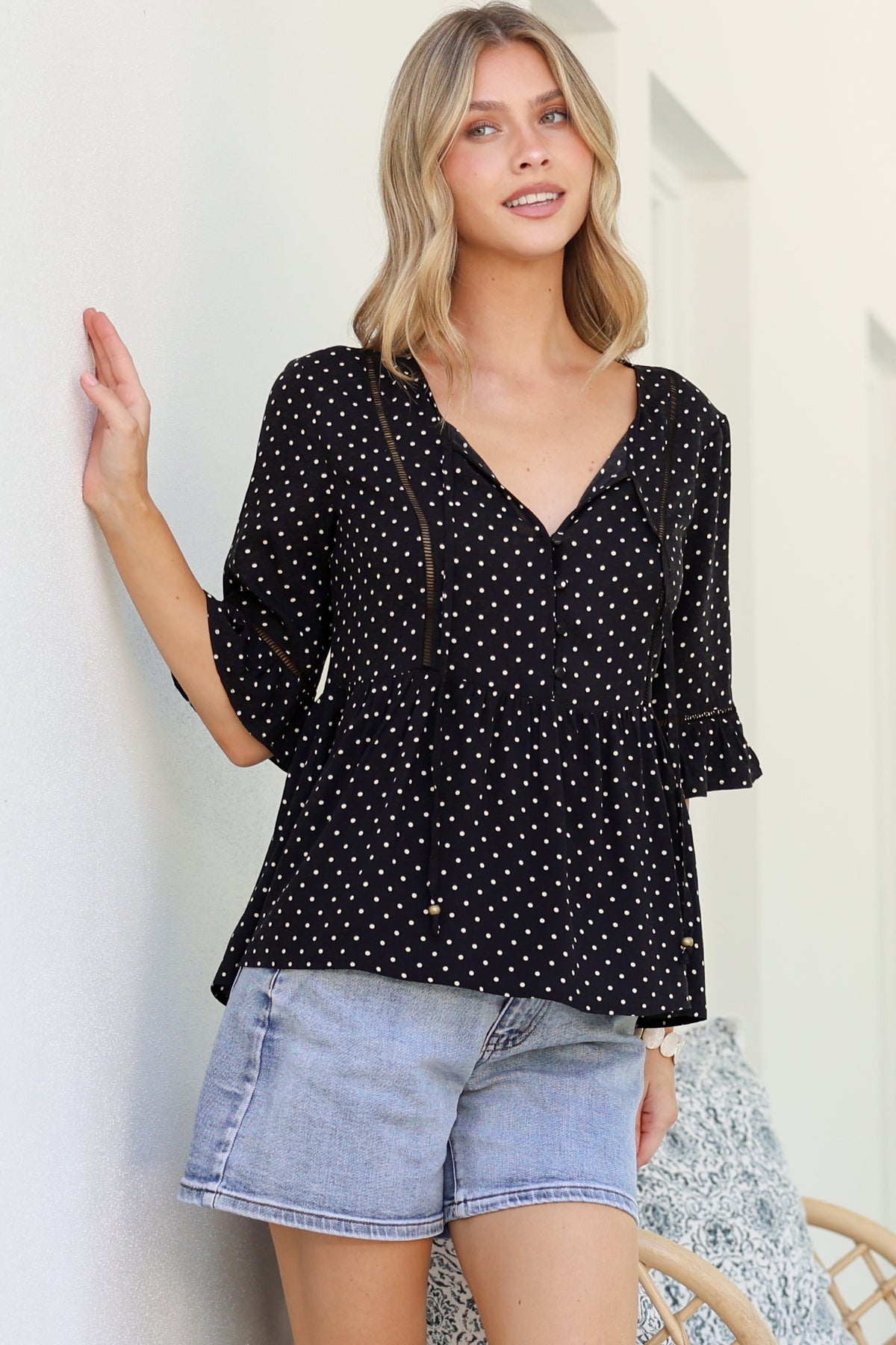 Dustin Top - Tie Neck Button Bodice Peplum Top with Frill Cuff 3/4 Sleeves in Spot Print Black