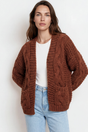 Model wearing Elias Cardigan in Brown from Salty Crush