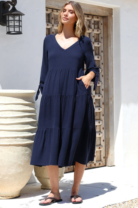 Model wearing Elisabette Midi Dress in Navy from Salty Crush