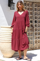 Model wearing Elisabette Midi Dress in Rust from Salty Crush