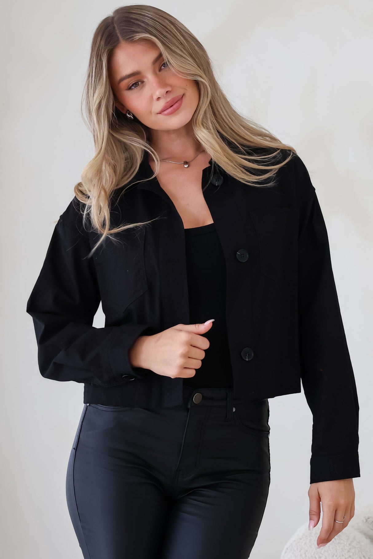 Model wearing Elma Jacket in Black from Salty Crush