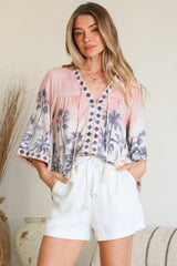 Model wearing Elysia Blouse in Armena Print from Salty Crush