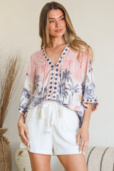 Model wearing Elysia Blouse in Armena Print from Salty Crush