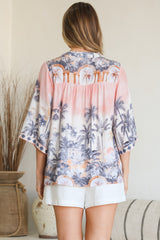Model wearing Elysia Blouse in Armena Print from Salty Crush