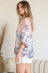 Model wearing Elysia Blouse in Armena Print from Salty Crush