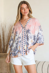 Model wearing Elysia Blouse in Armena Print from Salty Crush