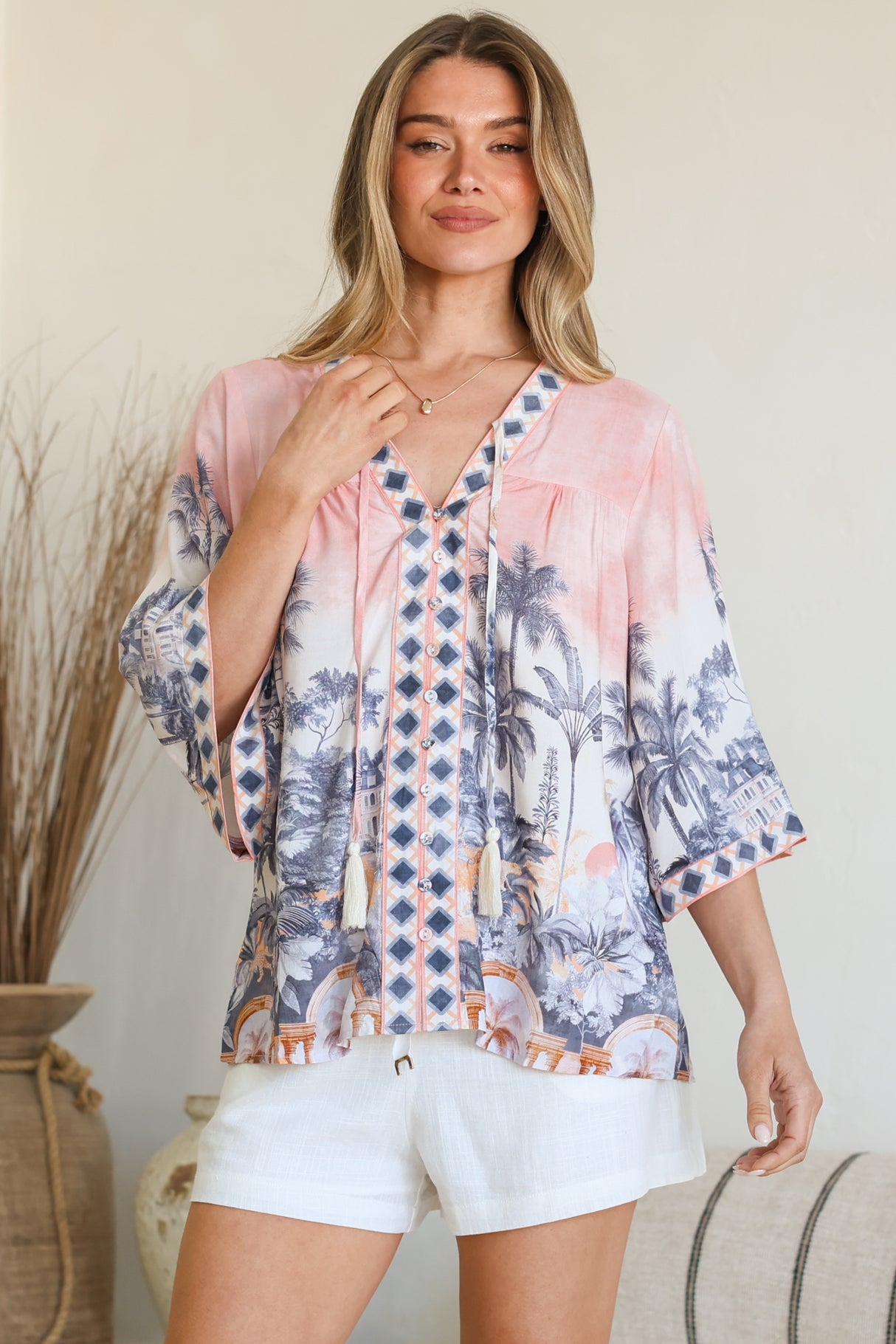 Model wearing Elysia Blouse in Armena Print from Salty Crush