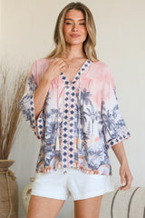 Model wearing Elysia Blouse in Armena Print from Salty Crush
