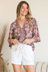 Model wearing Elysia Blouse in Leandra Print from Salty Crush