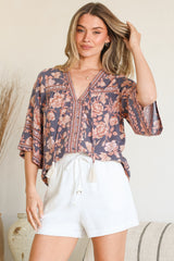 Model wearing Elysia Blouse in Leandra Print from Salty Crush