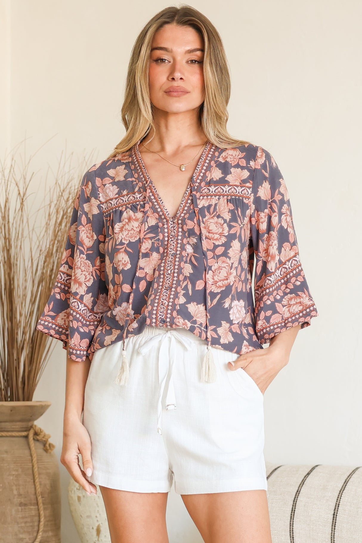 Model wearing Elysia Blouse in Leandra Print from Salty Crush