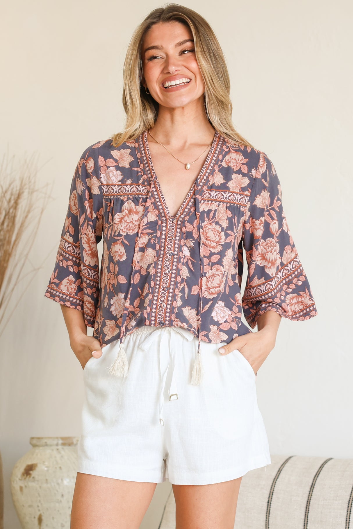 Model wearing Elysia Blouse in Leandra Print from Salty Crush