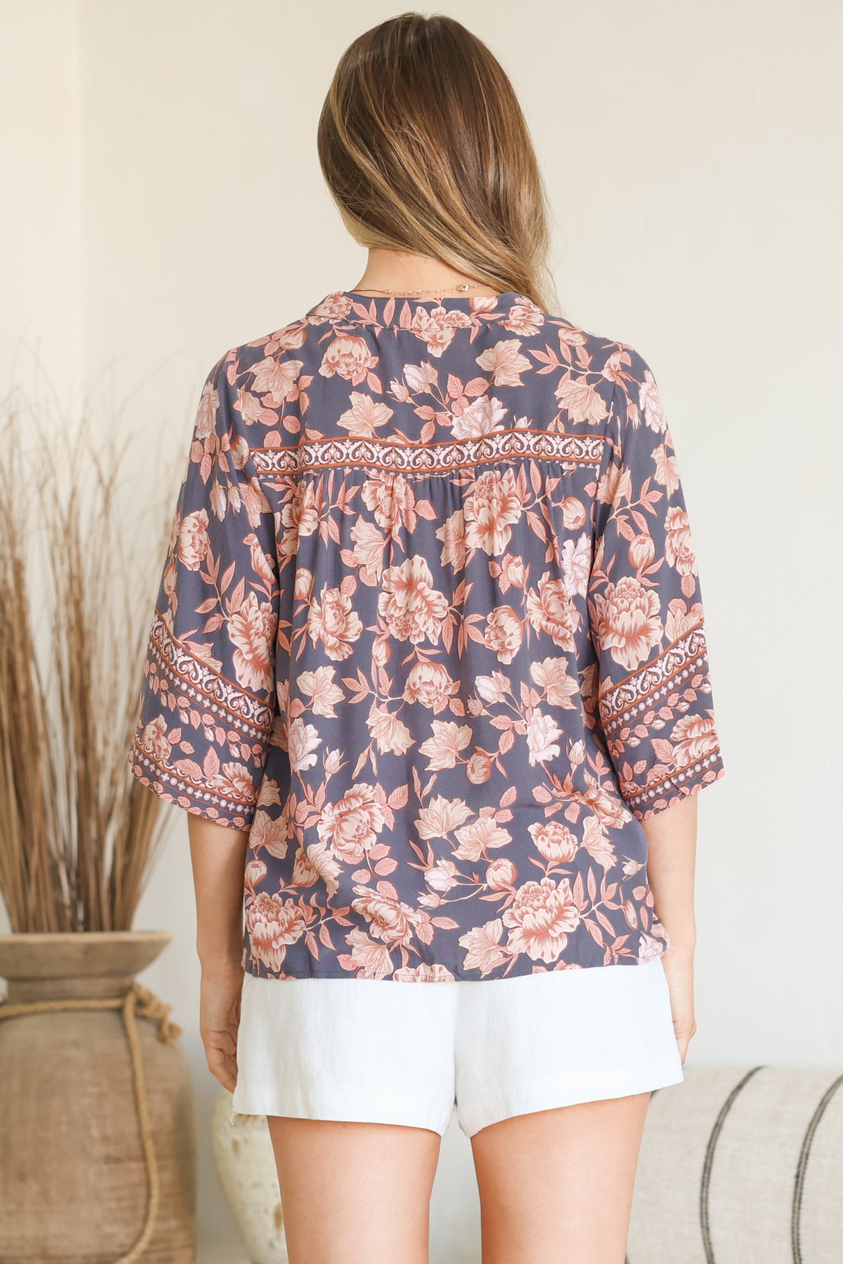 Model wearing Elysia Blouse in Leandra Print from Salty Crush