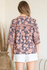Model wearing Elysia Blouse in Leandra Print from Salty Crush