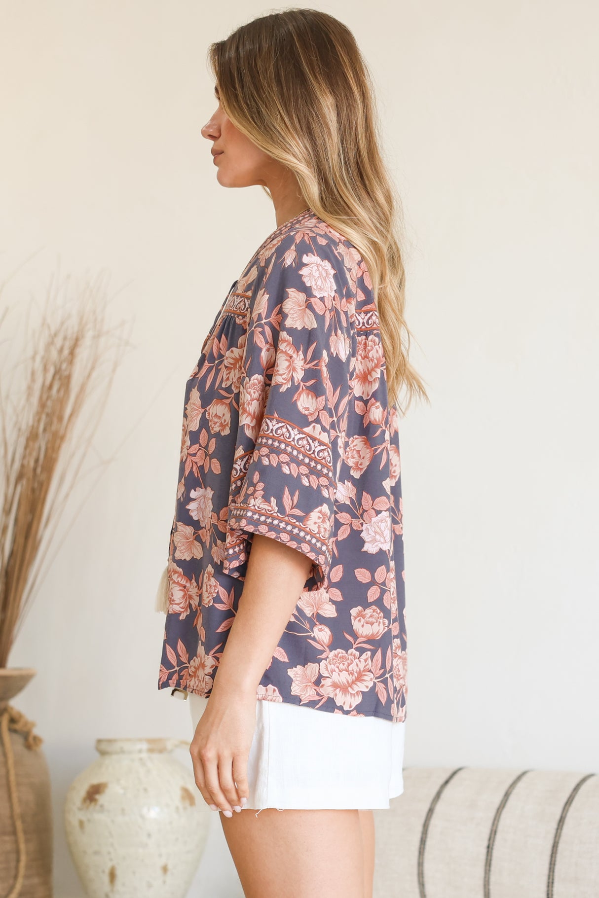 Model wearing Elysia Blouse in Leandra Print from Salty Crush