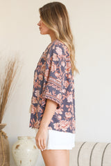 Model wearing Elysia Blouse in Leandra Print from Salty Crush