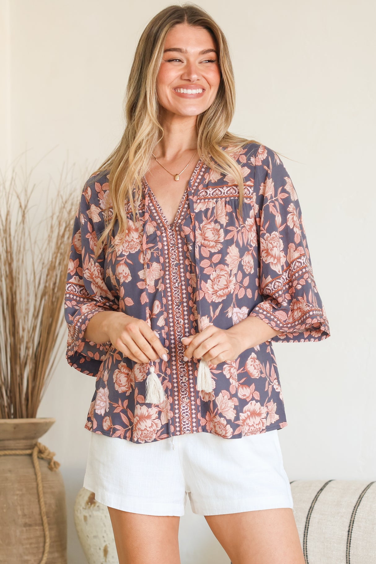 Model wearing Elysia Blouse in Leandra Print from Salty Crush