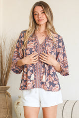 Model wearing Elysia Blouse in Leandra Print from Salty Crush