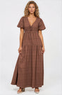 Model wearing Emirah Maxi Dress in Chocolate from Salty Crush
