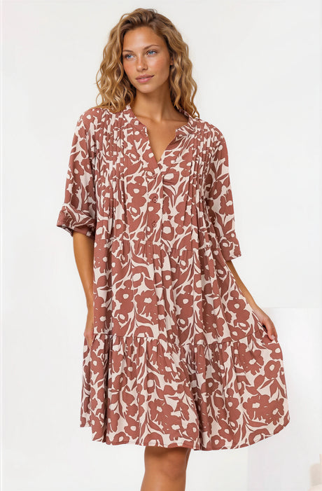 Model wearing Evie Mini Dress in Emma Jade Print Brown from Salty Crush