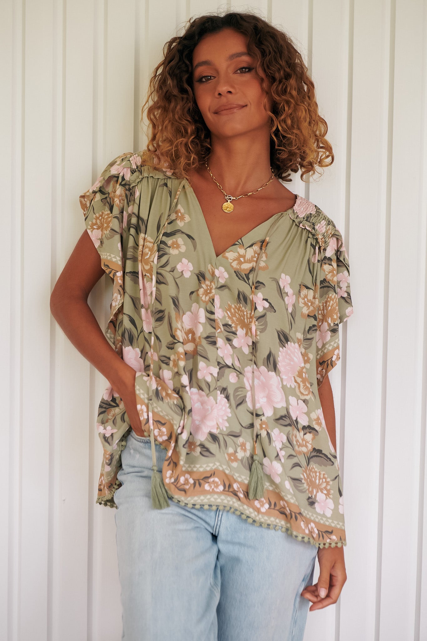 JAASE - Fisico Top: High V Neck Slouchy Blouse with Crochet Trim Hemline in Adore Print