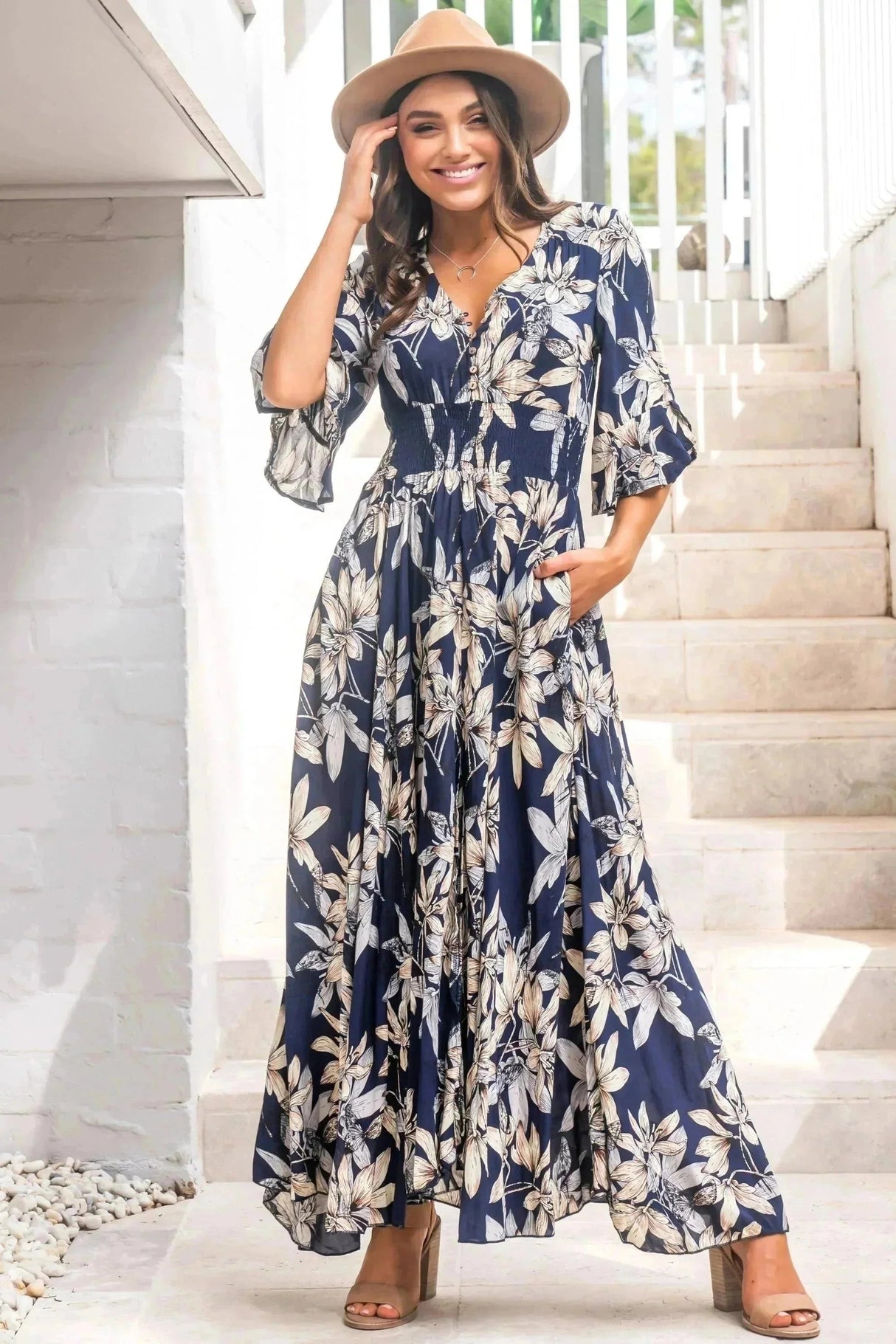 Model wears the Frigg Maxi Dress in Navy