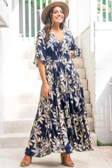 Mads wears the floral Frigg Maxi Dress in Navy - a best-selling style from saltycrush.com