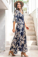 Female wears the floral boho Frigg Maxi Dress from Salty Crush