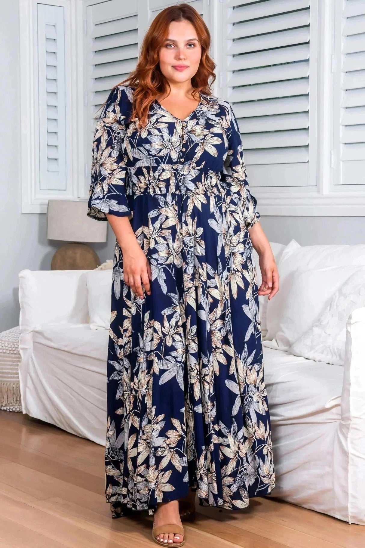 Model wears the Frigg Maxi Dress in Navy from saltycrush.com