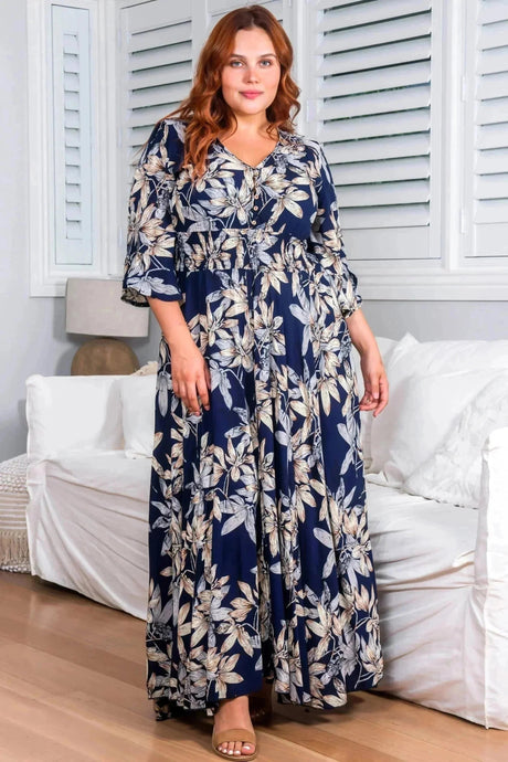 Model wears the Frigg Maxi Dress in Navy from saltycrush.com
