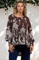 Model wearing Gelina Top in Gerry Print Chocolate from Salty Crush