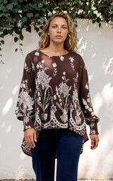 Model wearing Gelina Top in Gerry Print Chocolate from Salty Crush