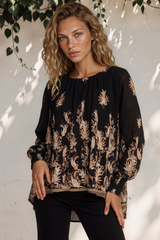 Model wearing Gelina Top in Lynsey Print Black from Salty Crush