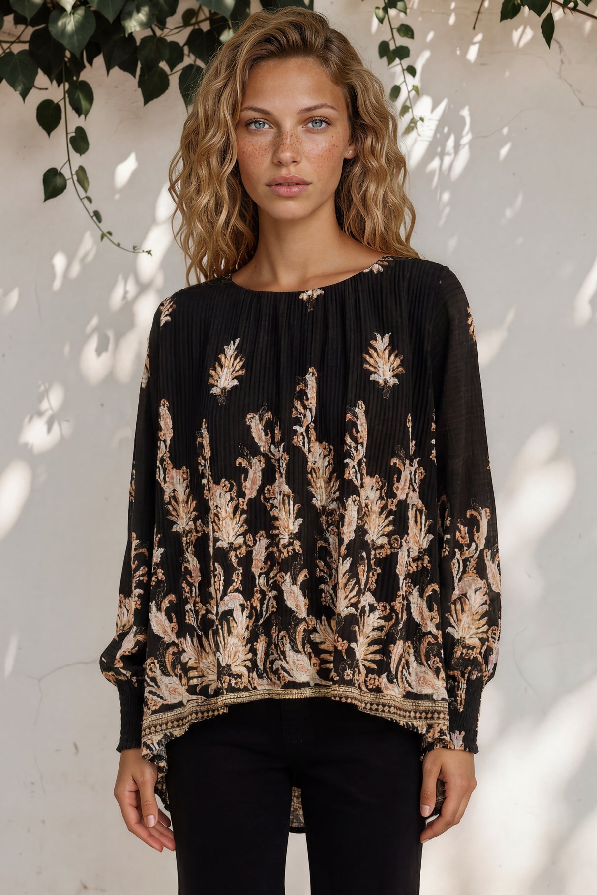 Model wearing Gelina Top in Lynsey Print Black from Salty Crush