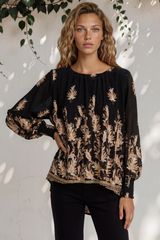 Model wearing Gelina Top in Lynsey Print Black from Salty Crush