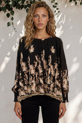 Model wearing Gelina Top in Lynsey Print Black from Salty Crush