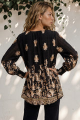 Model wearing Gelina Top in Lynsey Print Black from Salty Crush