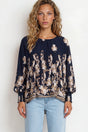 Model wearing Gelina Top in Lynsey Print Navy from Salty Crush