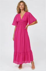 Model wearing Glades Maxi Dress in Hot Pink from Salty Crush